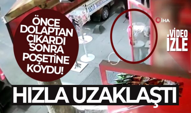 Önce dolaptan çıkardı sonra poşetine koydu
