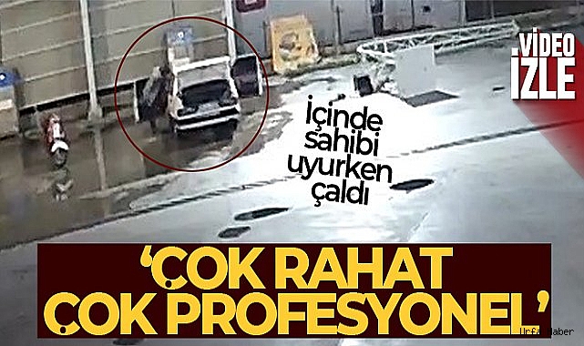 Sahibinin içinde uyuduğu araçtan cep telefonunu çalıp rahat tavırlarıyla pes dedirtti