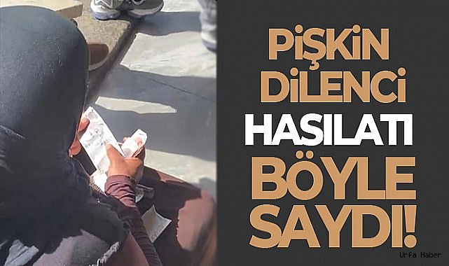 Taksim'de hasılatı sayan dilenci kadın kamerada