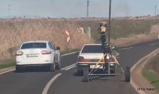 HELEZON MAKİNESİNİ OTOMOBİLE BAĞLAYARAK ÇEKTİ